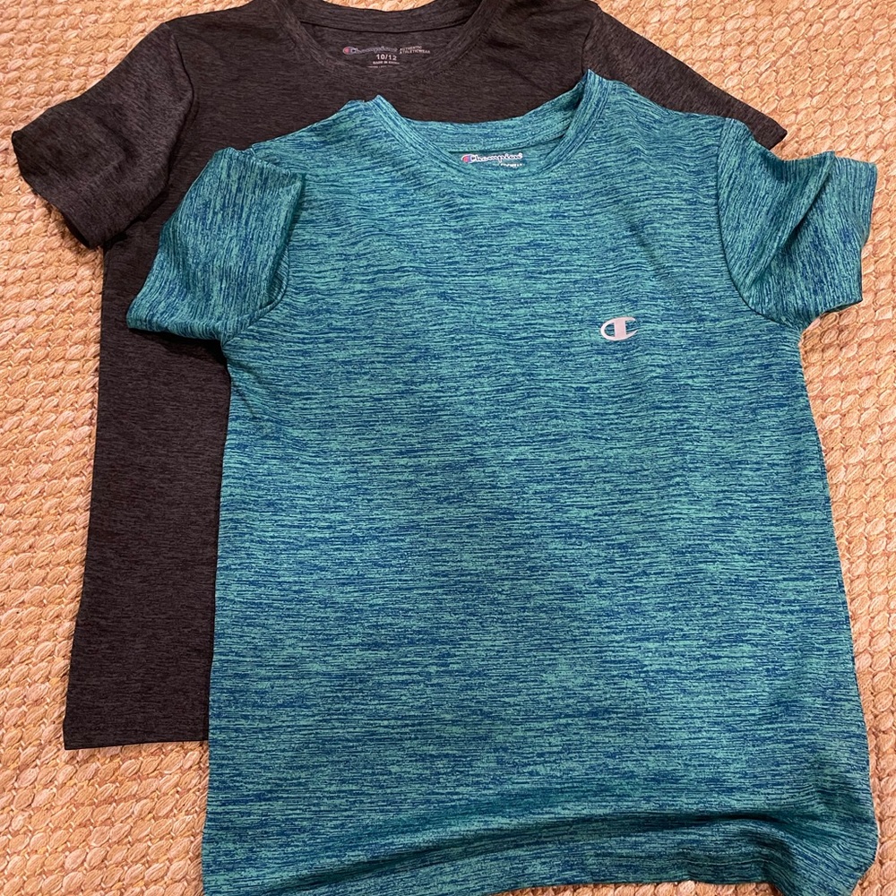 2 boys Champion shirts